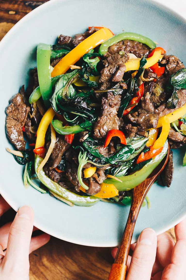 Delicious Thai basil and beef (pad krapow) stir-fried with bell peppers in a bowl