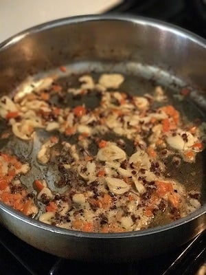 Sizzling bubbling hot Chinese aromatics in a saute skillet