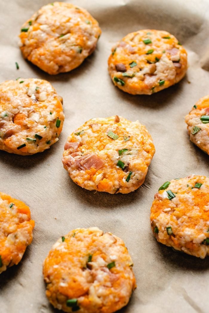 A photo shows meatballs being flattened to patties before pan frying