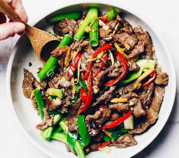 Paleo Mongolian Beef with juicy sizzling hot beef steak s gluten-free, Whole30 and Keto friendly from I Heart Umami.