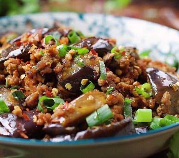 Paleo Asian Taco Meal Prep Bowls. Chinese-inspired eggplant meat sauce with tons of fresh veggies. Perfect Paleo and Whole30 meal prep dish!