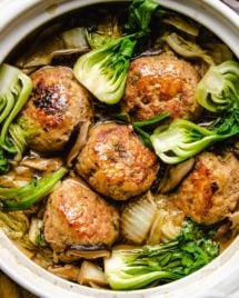 Photo shows jumbo meatballs and napa cabbage stew in a big white clay pot