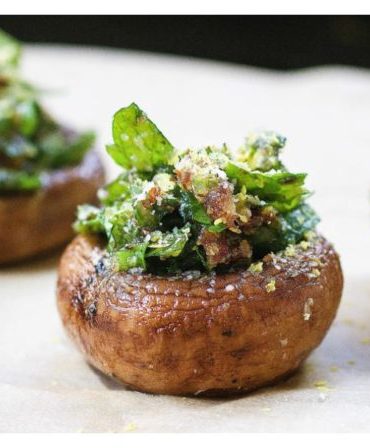 Easy and “cheesy” Herb Stuffed Mushrooms that are gluten, dairy free and vegan friendly. Perfect make ahead appetizer and side dish recipe.