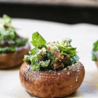 Easy and “cheesy” Herb Stuffed Mushrooms that are gluten, dairy free and vegan friendly. Perfect make ahead appetizer and side dish recipe !