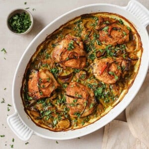 A recipe image shows leeks and chicken thighs baked in a white casserole dish.