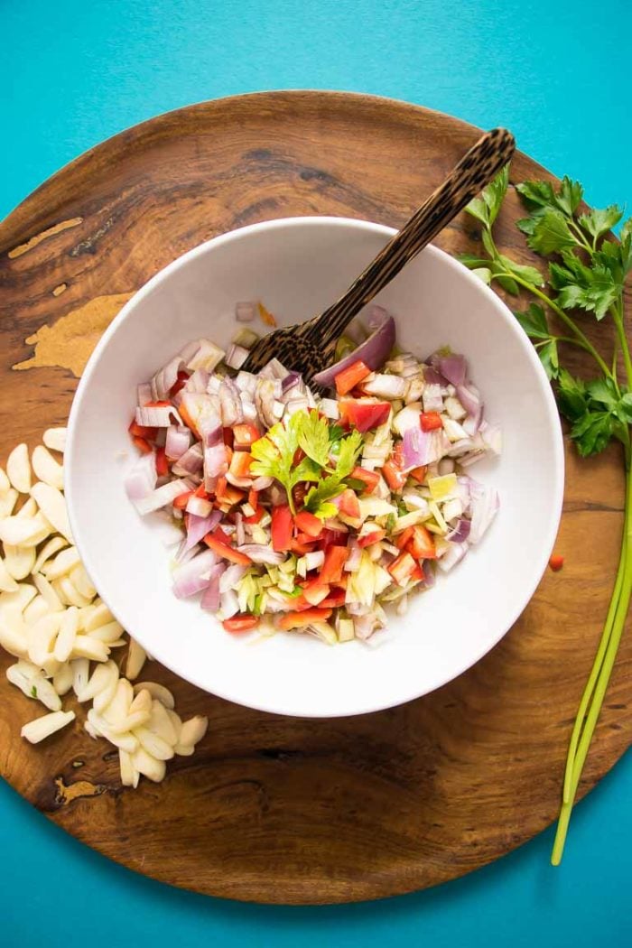 Paleo Fish en Papillote recipe, wrapped in parchment paper with Thai lemongrass and crispy garlic cloves.