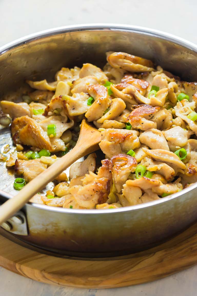 Juicy stir-fried chicken breasts sauteed in a hot skillet. 