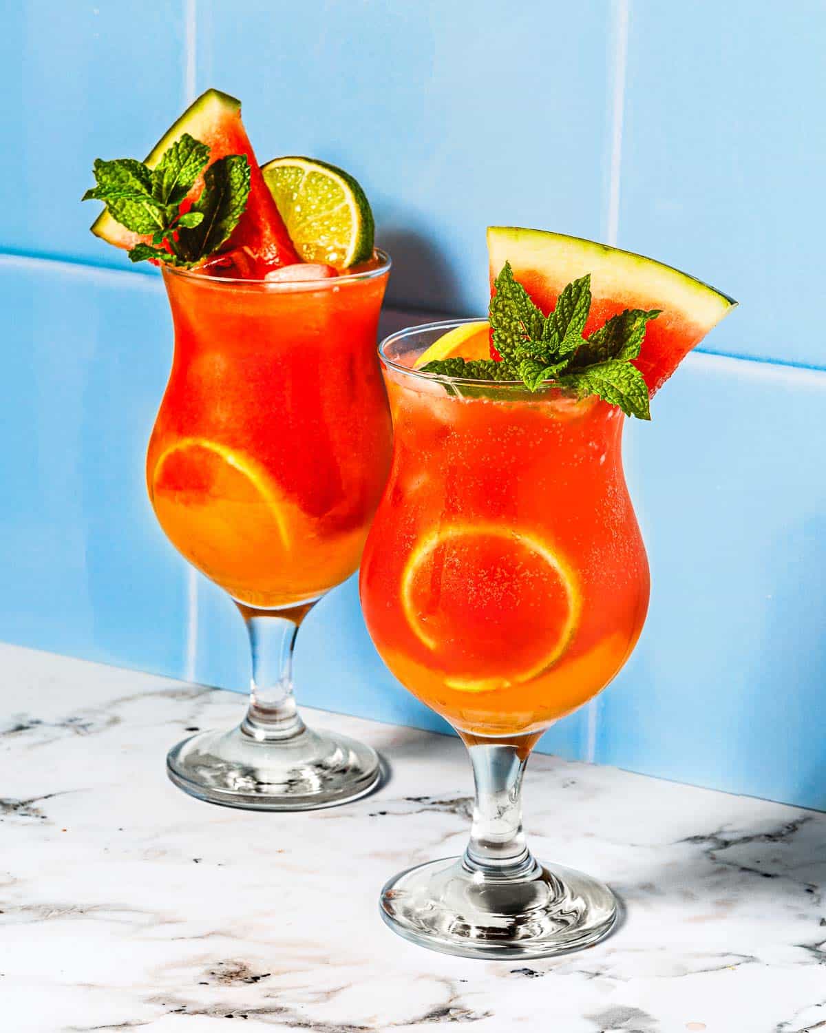 Image shows 2 glasses of Watermelon drinks non-alcoholic.