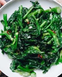 Easy Chinese Broccoli stir fry (kai lan) with garlicky sauce is a Vegan, Paleo, Whole30, Keto, and low carb recipe.