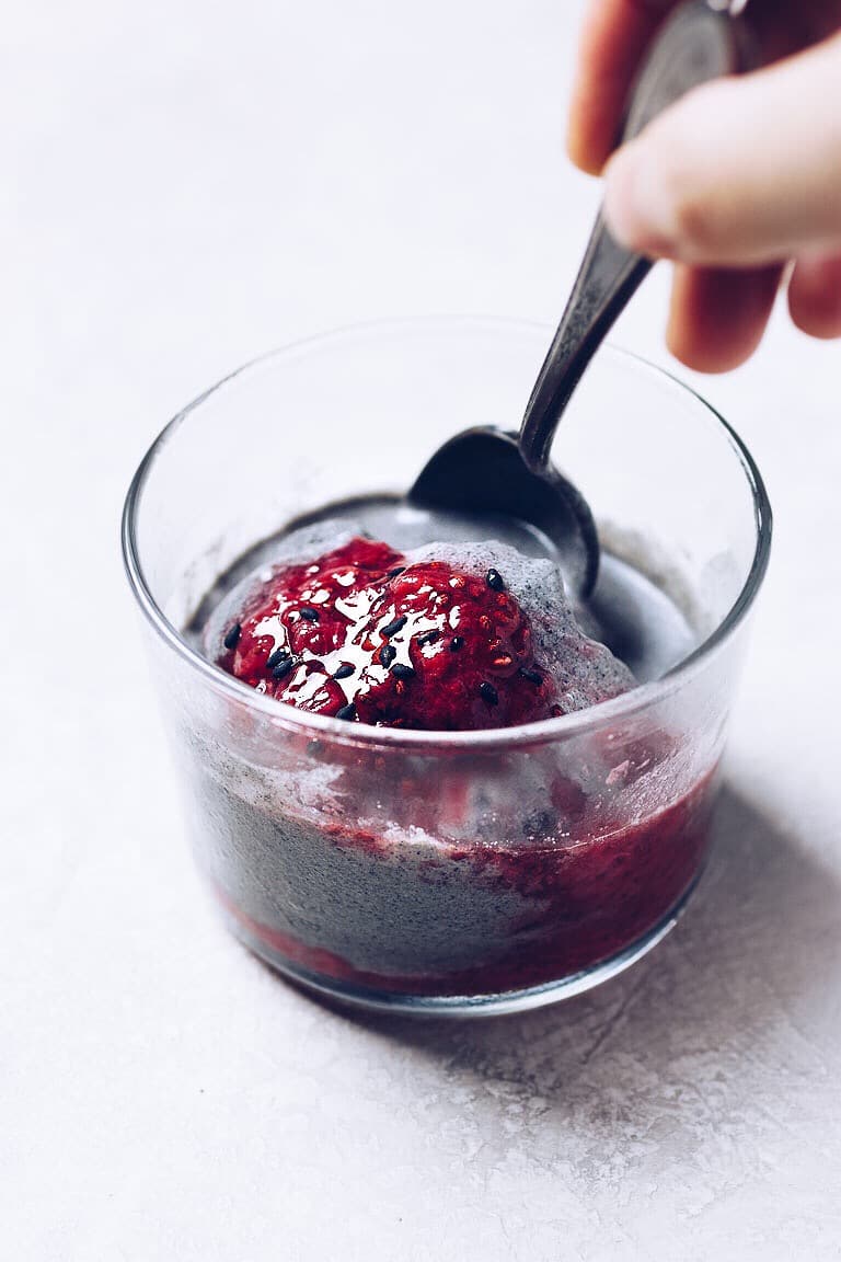 No Churn Black Sesame Coconut Milk Ice Cream recipe with Strawberry Compote topping and sweetened with maple syrup.