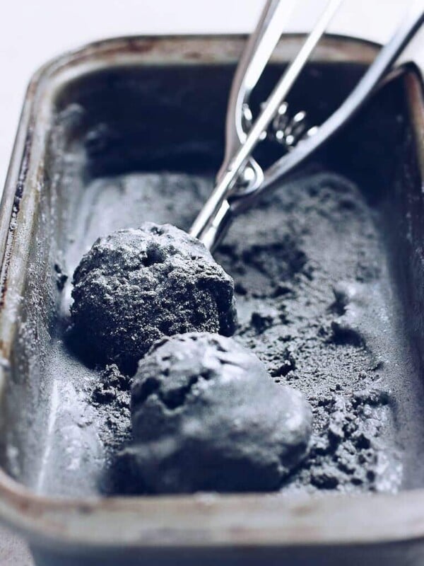 Photo shows homemade black sesame ice cream served in a chilled container