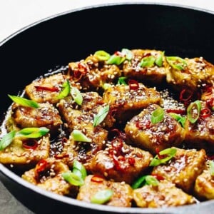 Paleo Crispy Sesame Tofu recipe with oven baked soy free egg custard tofu in Whole30 Sesame Sauce.