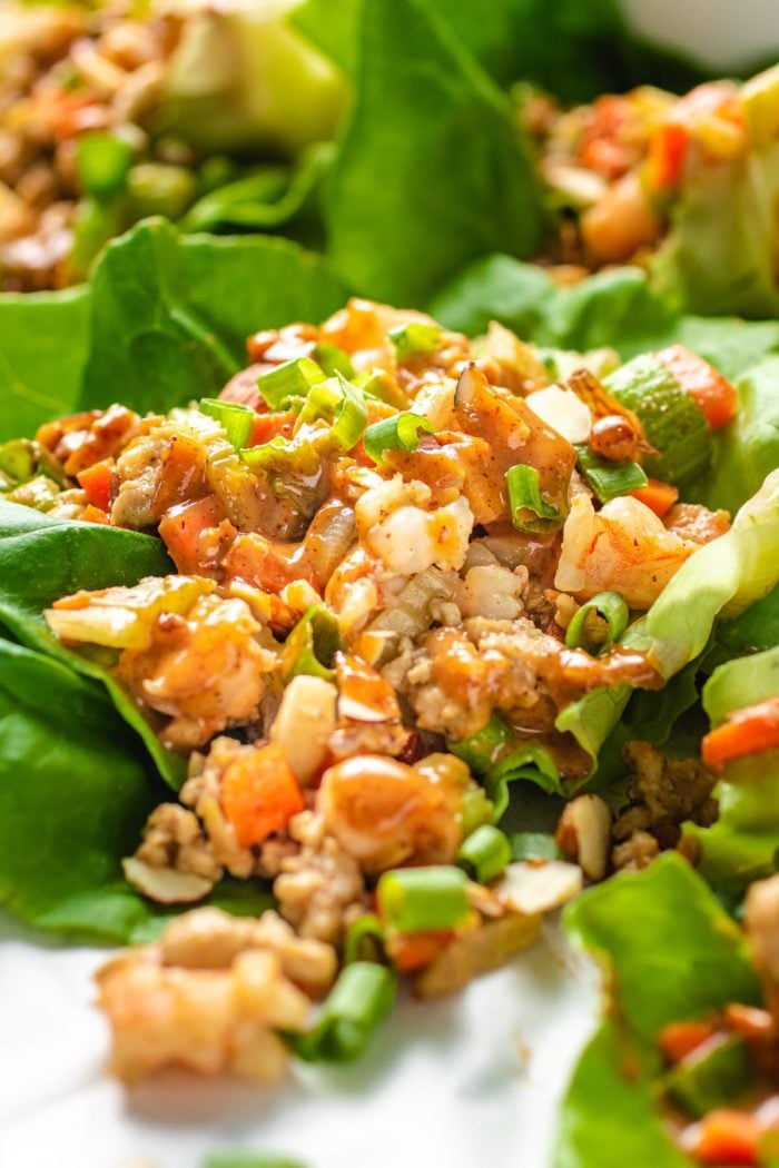 Close shot of the chicken lettuce wraps with sauce