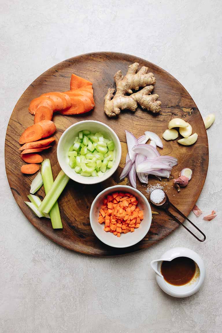 Healthy Paleo Chinese Chicken Lettuce Wraps recipe with chicken or shrimp, loaded with crunchy vegetables in a sweet savory brown sauce.