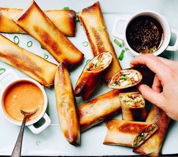 Paleo Egg Rolls recipe with coconut wraps baked in oven until golden crispy. These egg rolls are low carb Whole30 and Keto friendly.