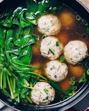 Paleo Chinese Chicken or Turkey Meatball Soup Recipe with spinach and no eggs in Asian ginger chicken broth from I Heart Umami.