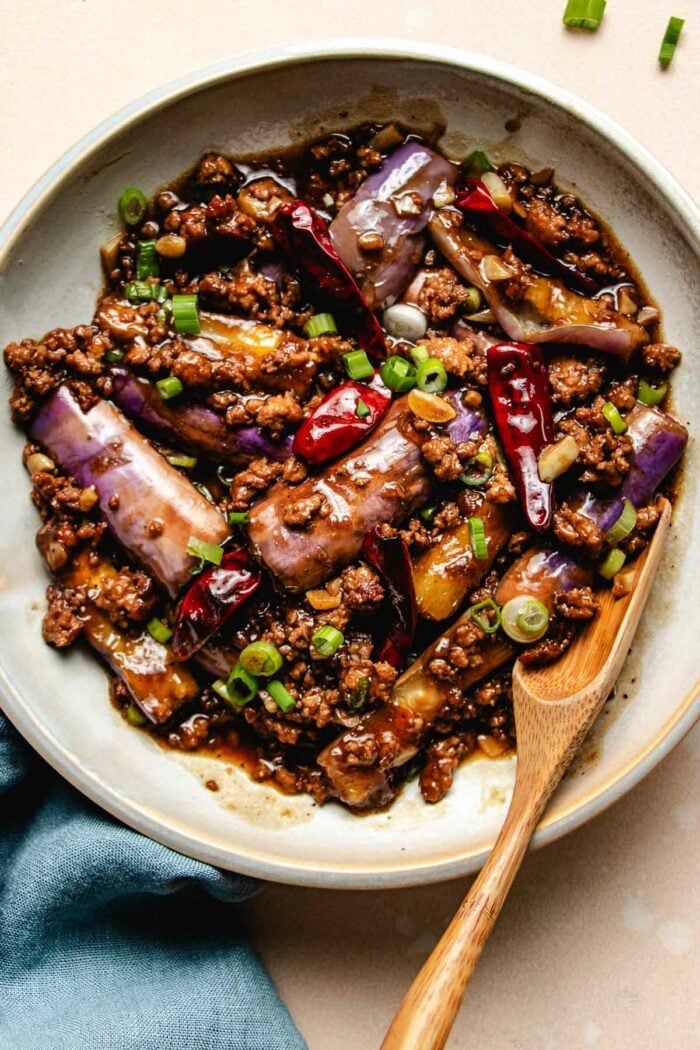 Photo shows Yuxiang Chinese eggplant stir fried with garlic sauce served on a white plate