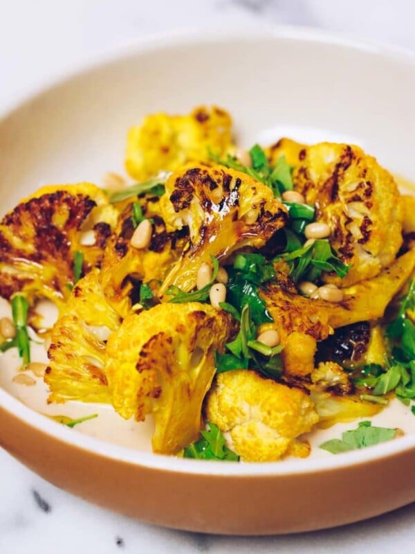 Paleo Roasted Cauliflower Recipe with tahini-lemon sauce from I Heart Umami.