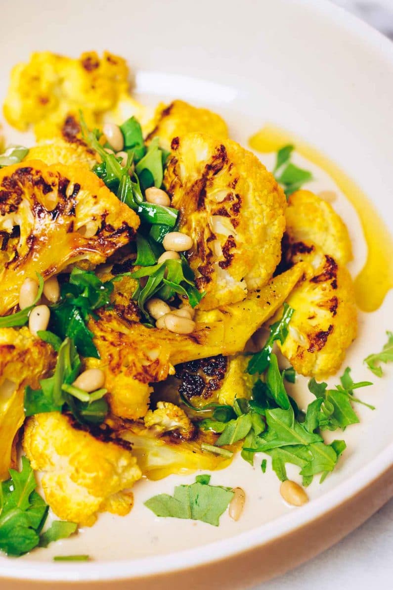 Paleo Roasted Cauliflower Recipe with tahini-lemon sauce from I Heart Umami.