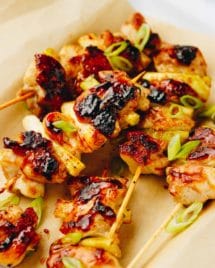 Grilled Yakitori Chicken on the skewers and served on a plate