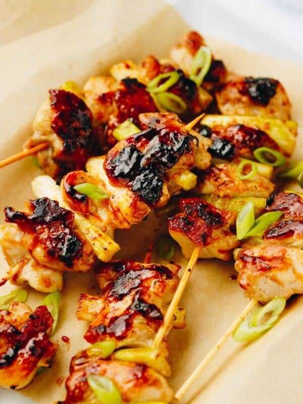 Grilled Yakitori Chicken on the skewers and served on a plate