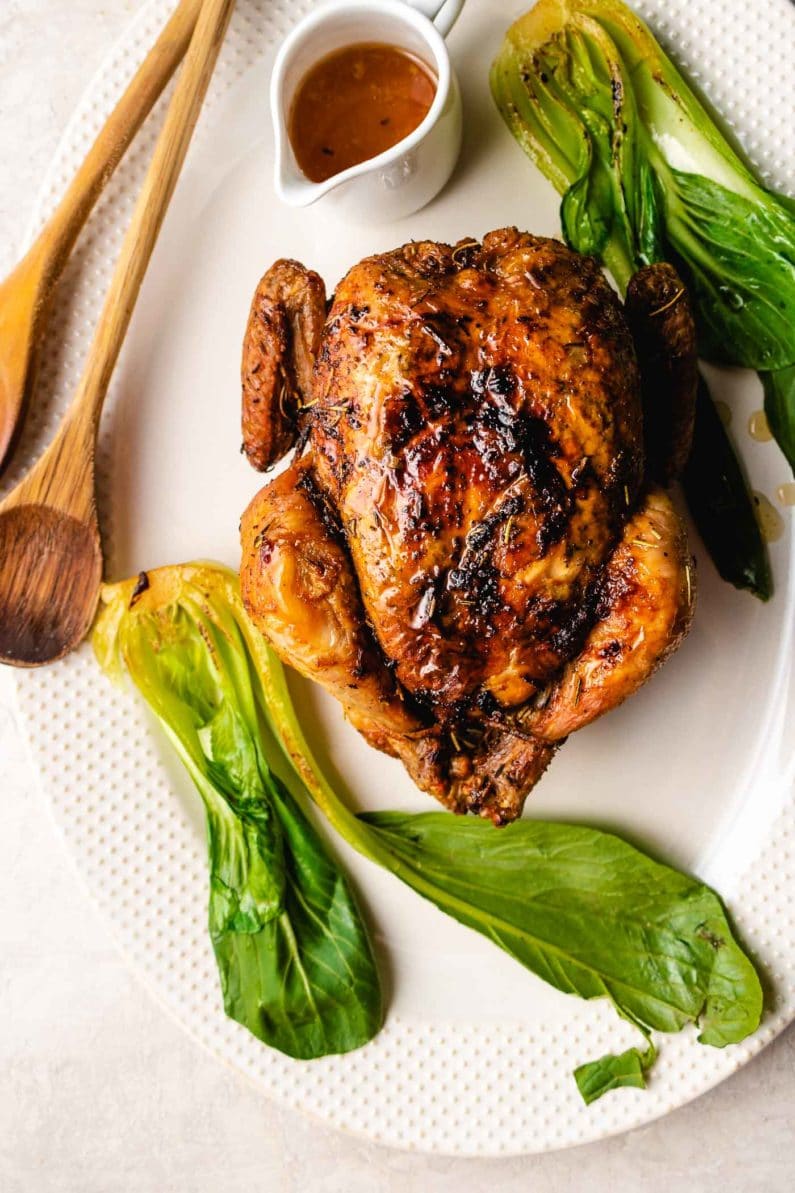 Serve the chicken with gravy and baby bok choy in a large plate