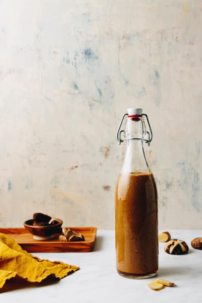 Vegetarian oyster sauce recipe made with shiitake mushrooms packed in a glass jar