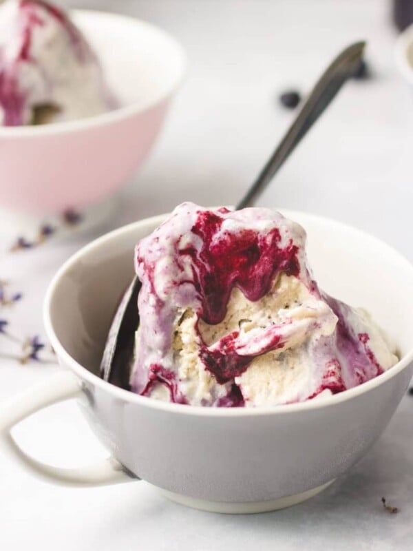 A dairy-free/no churn Lavender Honey Ice Cream recipe with blueberry-lavender syrup is paleo and keto friendly.