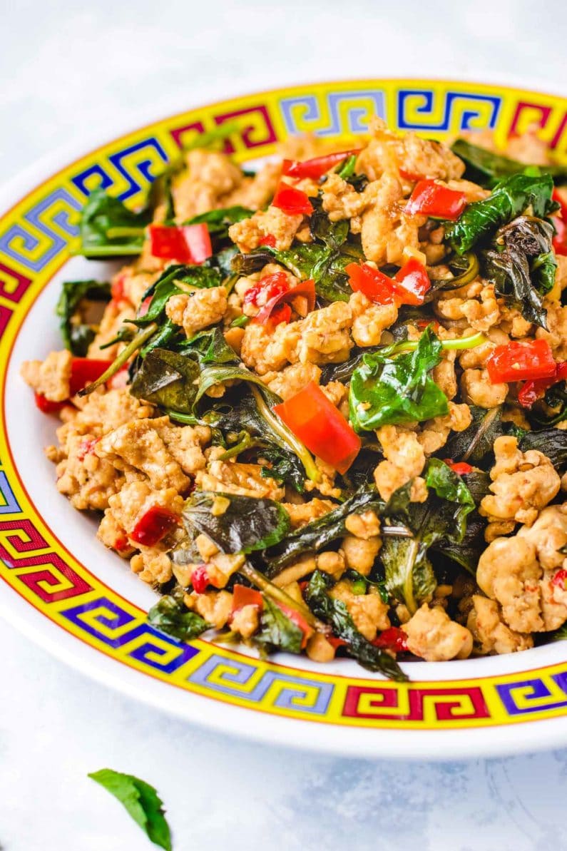 Thai basil chicken recipe uses ground chicken and is Paleo, Whole30, and low carb friendly.