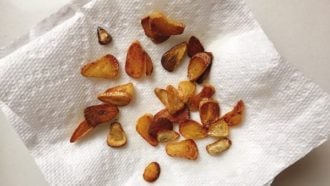 Drain garlic chips