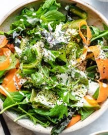 Asian Green Tatsoi salad with carrots and cucumber in ranch yogurt dressing