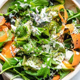 Asian Green Tatsoi salad with carrots and cucumber in ranch yogurt dressing