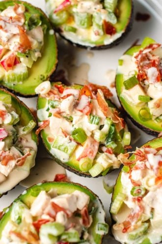 A photo shows stuffed avocados with chicken and apple