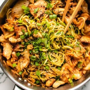 Kimchi and Chicken Stir-Fry with Zucchini Noodles in a large skillet.