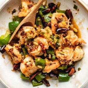 A feather photo shows the shrimp kung pao dish