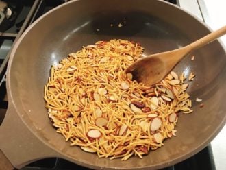 Step 3 lightly toast the chow mein noodles with almonds on a stovetop