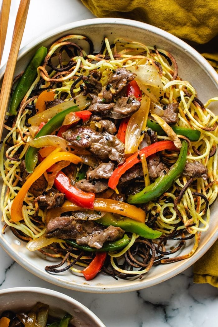 Beef chow mein served in individual serving plate