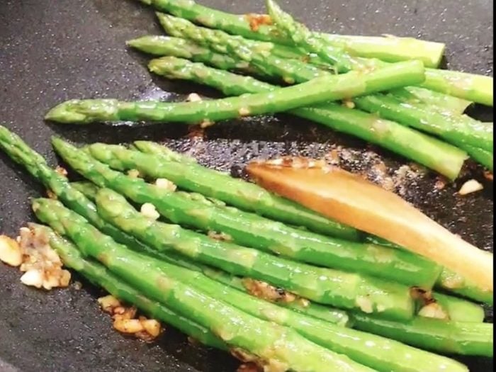 Add the asparagus to the sauce