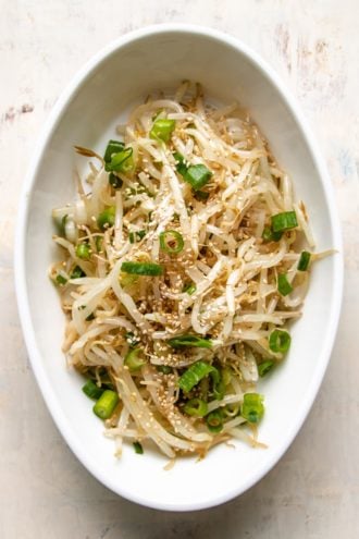 cooked bean sprouts in a white plate