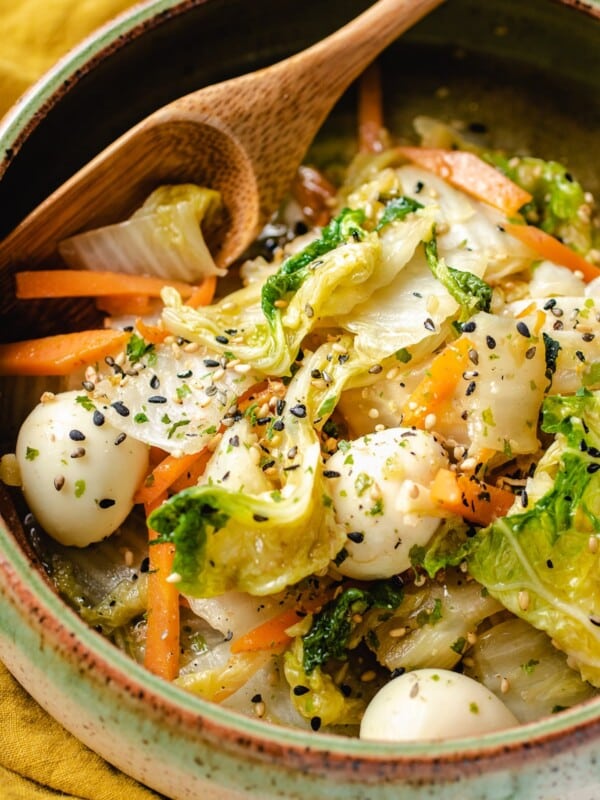 Sauteed Napa Cabbage served in a green bowl