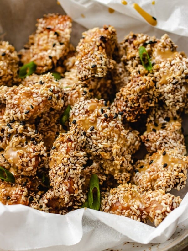 A plate loaded with crispy sesame chicken