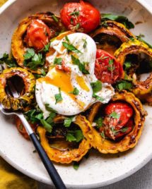 Roasted-Cherry-Tomatoes-with delicata squash served over a white plate