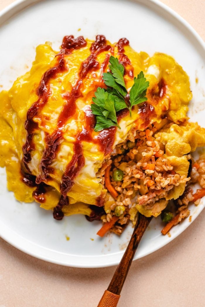 Japanese Omurice served on a white plate