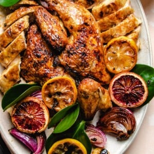 An overhead photo shows the roasted chicken with maple orange gravy on the side