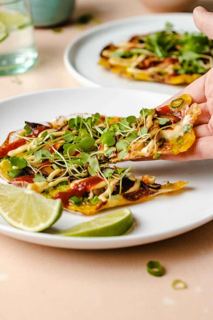 A side shot shows lifting a slice of rice paper pizza out of the plate