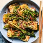 A recipe image shows kimchi made with bok choy served on a blue color plate