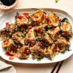 A recipe image shows Chinese air fryer eggplant with sweet garlic balsamic sauce served on a white plate