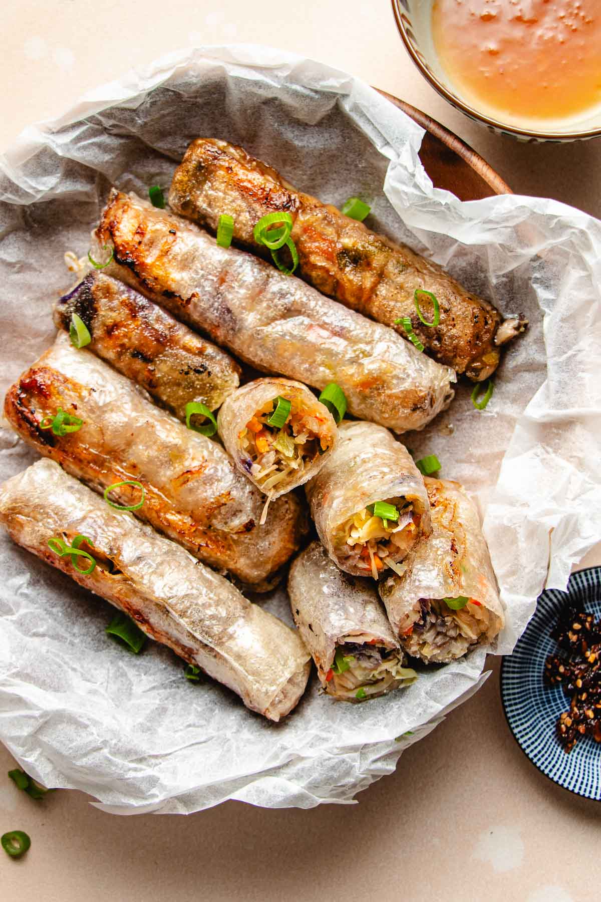 Gluten free egg rolls wrapped with rice paper sheets and fried to crispy.