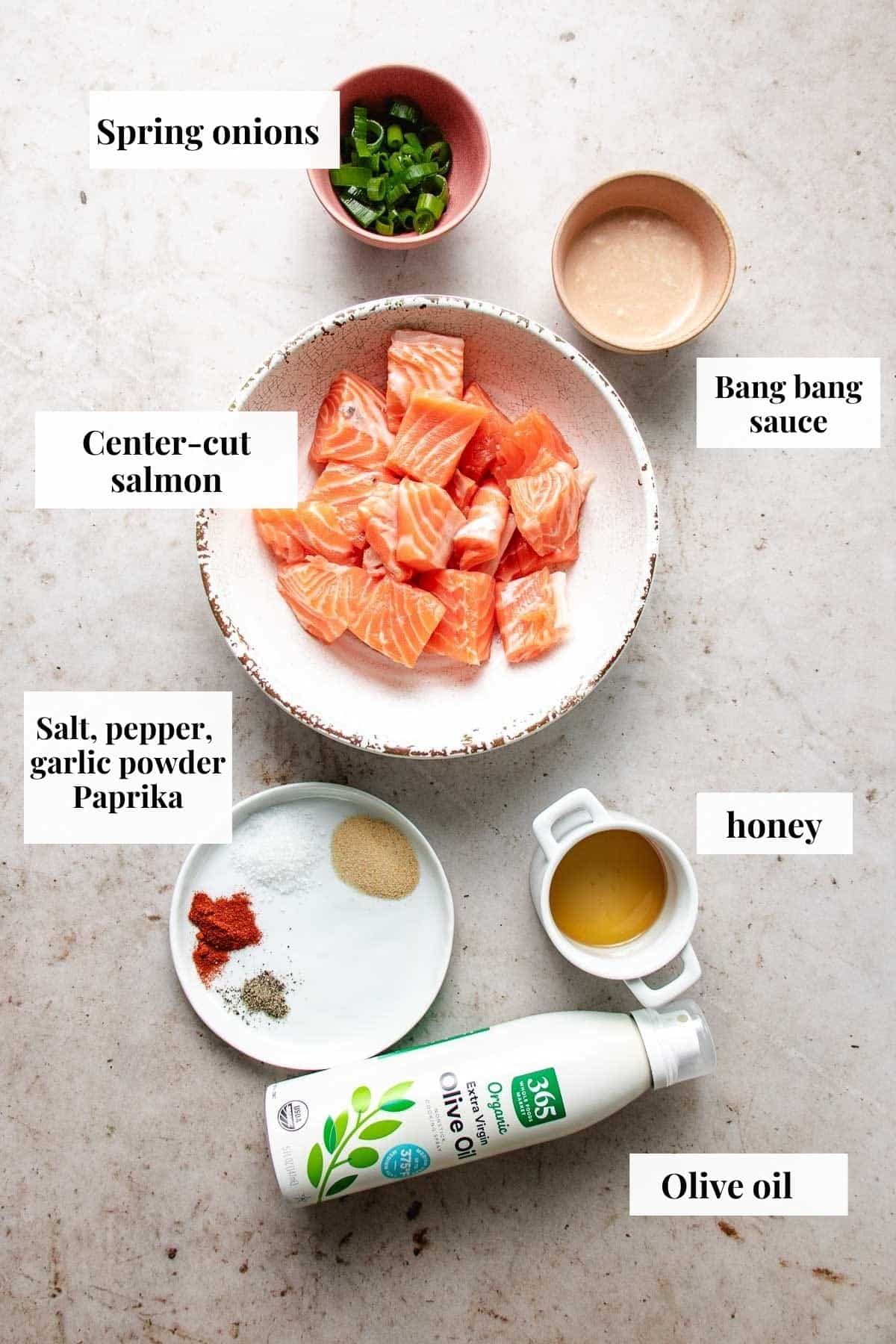 An ingredient photo image shows what are needed to make bang bang salmon bites.