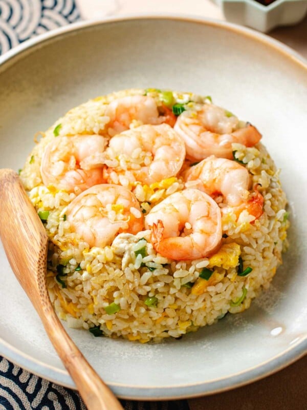 Image shows Din Tai Fung fried rice recipe with shrimp and eggs plated and served just like the restaurant's in a plate.